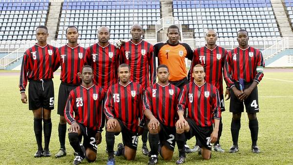 Montserrat's team poses before the 2014