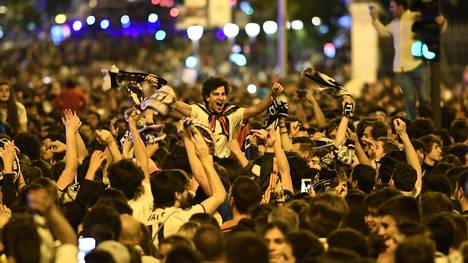 Anhänger von Real Madrid feiern den Gewinn der Champions League
