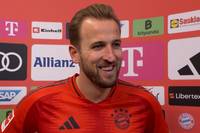 Harry Kane erzielt gegen den FC Augsburg einen artistischen Treffer und beweist eine starke Flexibilität. Davon ist sogar die eigene Gattin überrascht.