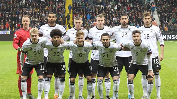 (Back row, From L), Germany's goalkeeper Marc-Andre Ter Stegen, Germany's defender Jonathan Tah, Germany's midfielder Toni Kroos, Germany's defender Lukas Klostermann, Germany's midfielder Emre Can and Germany's midfielder Leon Goretzka (Front row, From L) Germany's forward Julian Brandt, Germany's forward Serge Gnabry, Germany's midfielder Joshua Kimmich, Germany's midfielder Ilkay Gundogan and Germany's defender Jonas Hector pose for the team photo prior to the UEFA Euro 2020 Group C qualification football match Germany v Northern Ireland in Frankfurt am Main, western Germany  on November 19, 2019. (Photo by Daniel ROLAND / AFP) (Photo by DANIEL ROLAND/AFP via Getty Images)