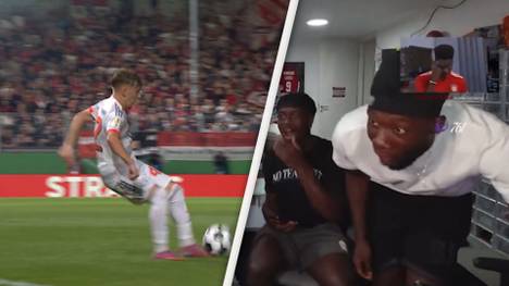 Lennart Karl düpiert im Pokalspiel gegen Wiesbaden seinen Gegenspieler mit einem frechen Lupfer. Die Aktion begeistert auch Mitspieler Alphonso Davies, der die Partie live auf Twitch verfolgt.
