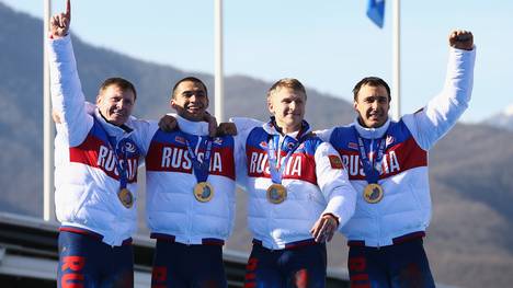 Alexej Wojewoda (r.) gewann 2014 mit dem russischen Viererbob Olympiagold