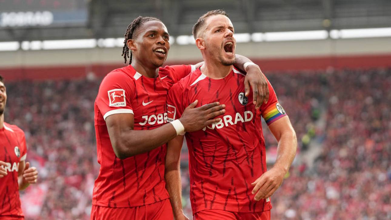 Freiburgs Christian Günter (r.) trifft sehenswert gegen den FC Augsburg