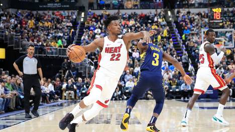 INDIANAPOLIS, INDIANA - JANUARY 08:  Jimmy Butler #22 of the Miami Heat dribbles the ball against the Indiana Pacers at Bankers Life Fieldhouse on January 08, 2020 in Indianapolis, Indiana.    NOTE TO USER: User expressly acknowledges and agrees that, by downloading and or using this photograph, User is consenting to the terms and conditions of the Getty Images License Agreement. (Photo by Andy Lyons/Getty Images)