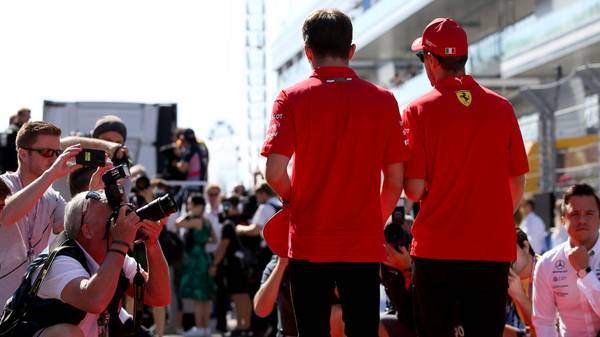 SOCHI, RUSSIA - SEPTEMBER 29: Charles Leclerc of Monaco and Ferrari and Sebastian Vettel of Germany and Ferrari look on, on the drivers parade before the F1 Grand Prix of Russia at Sochi Autodrom on September 29, 2019 in Sochi, Russia. (Photo by Charles Coates/Getty Images)
