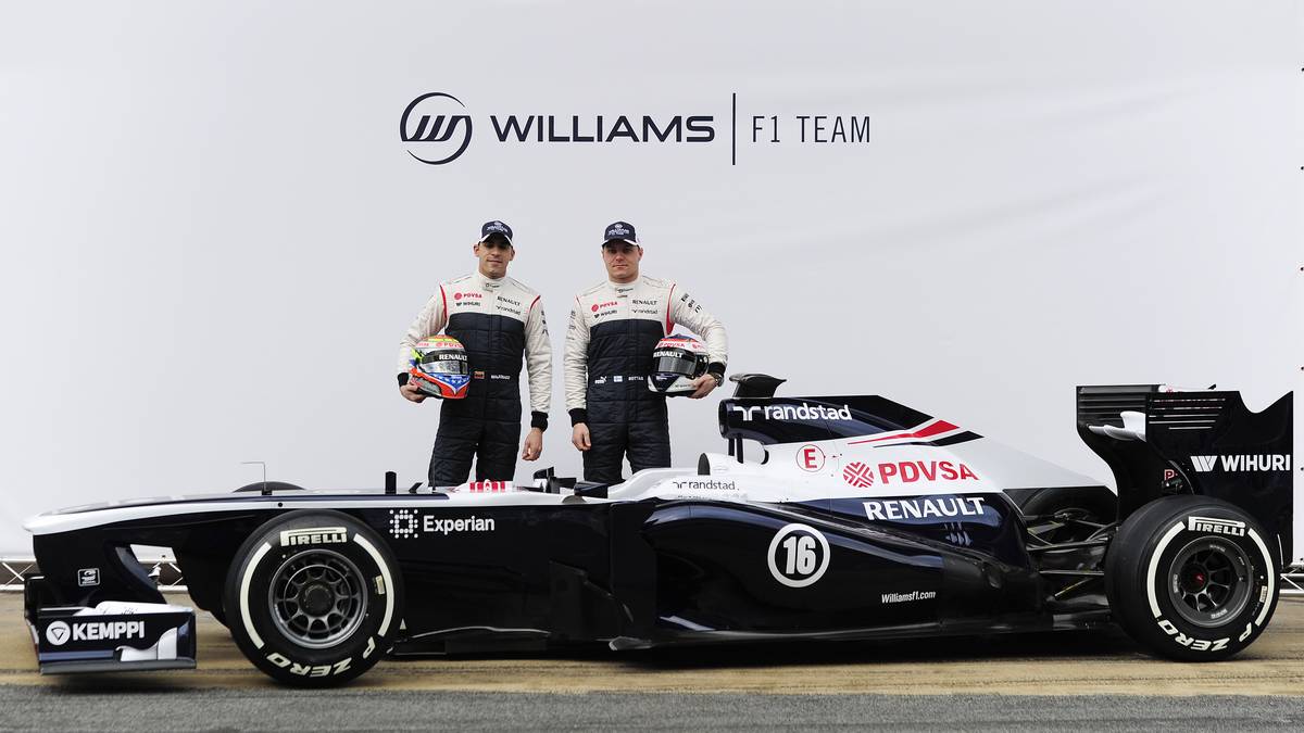 Formel 1:  Valtteri Bottas (r.) und Pastor Maldonado (l.) vor ihrem FW35. In diesem Jahren war Williams weit von Konkurrenzfähigkeit entfernt
