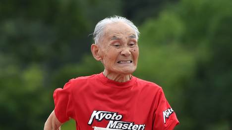 103-year-old Japanese sprinter Hidekichi Miyazaki runs during men's 100m dash