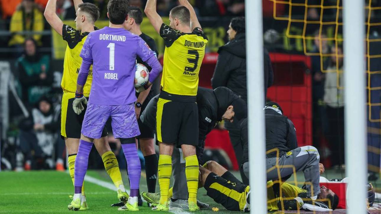 Emre Can liegt am Boden und muss behandelt werden