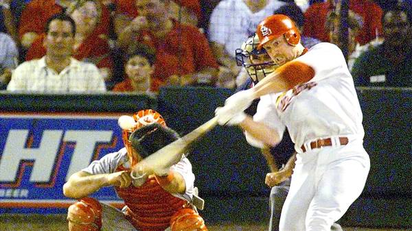 Mark McGwire of the St. Louis Cardinals swings for