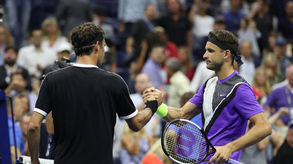 Grigor Dimitrov (r.) warf Roger Federer bei den US Open raus