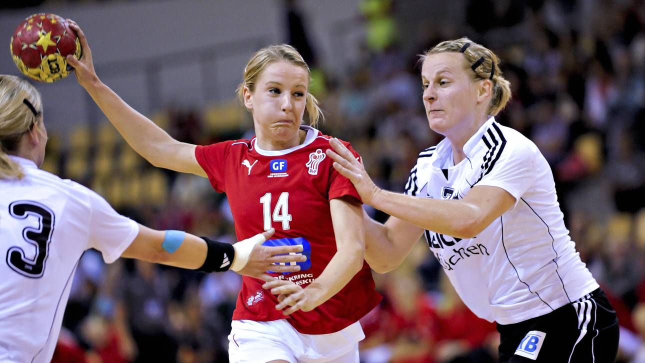 Denmark's Laerke Moller (C) challenges N