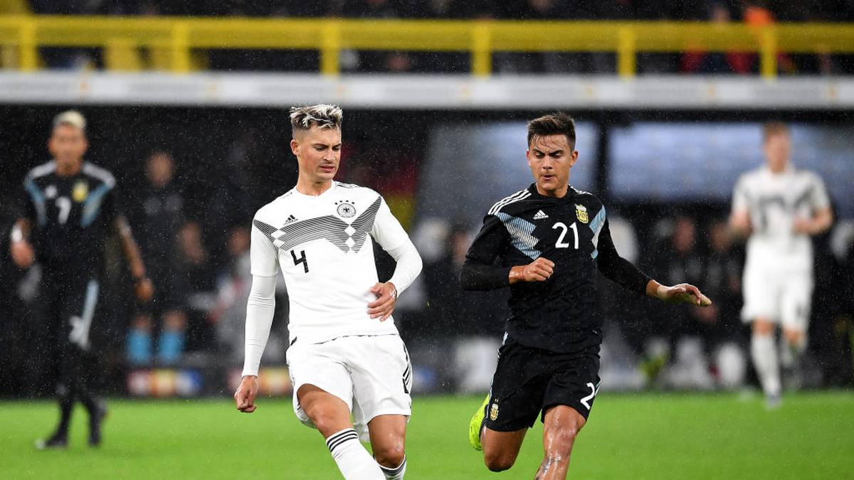 DORTMUND, GERMANY - OCTOBER 09: Robin Koch of Germany is closed down by Paulo Dybala of Argentina  during the International Friendly between Germany and Argentina at Signal Iduna Park on October 09, 2019 in Dortmund, Germany. (Photo by Jörg Schüler/Bongarts/Getty Images)