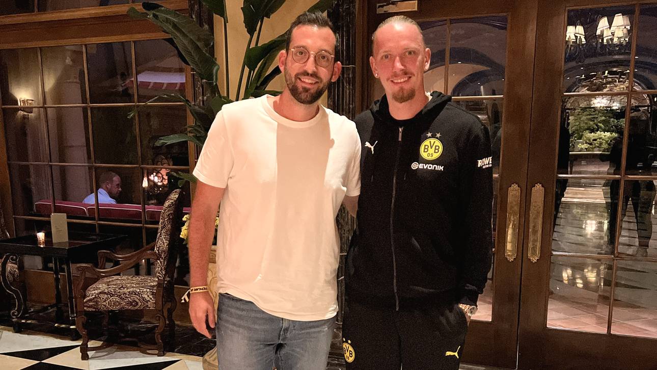 SPORT1-Chefreporter Patrick Berger (l.) und BVB-Profi Marius Wolf (r.)