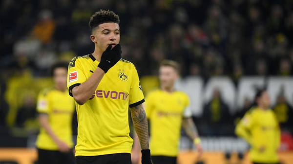 Dortmund's English midfielder Jadon Sancho reacts during the German first division Bundesliga football match Borussia Dortmund v SC Paderborn in Dortmund, western Germany, on November 22, 2019. (Photo by INA FASSBENDER / AFP) / RESTRICTIONS: DFL REGULATIONS PROHIBIT ANY USE OF PHOTOGRAPHS AS IMAGE SEQUENCES AND/OR QUASI-VIDEO (Photo by INA FASSBENDER/AFP via Getty Images)