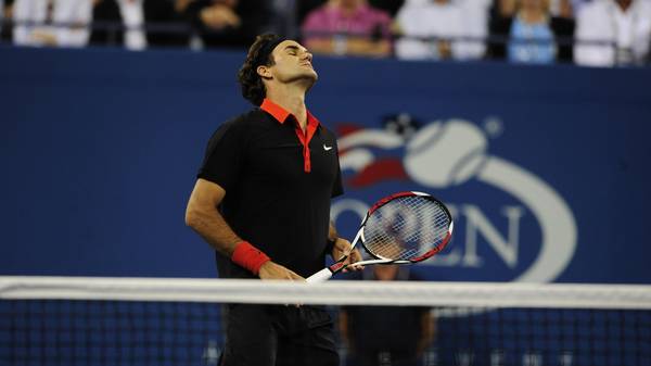 Tennis player  Roger Federer from Switzerland reacts while playing against Juan Martin Del Potro from Argentina during the final of the 2009 US Open at the USTA Billie Jean King National Tennis Center, in New York, September 14, 2009.  Del Potro won 3-6, 7-6, 6-4, 7-6, 6-2. AFP PHOTO/Emmanuel Dunand (Photo credit should read EMMANUEL DUNAND/AFP/Getty Images)