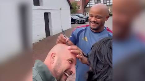 Dieser Bayern-Fan hat eine ganz besondere Idee. Das Autogramm von Vincent Kompany gibt es nämlich nicht auf Papier, sondern direkt auf die Glatze.