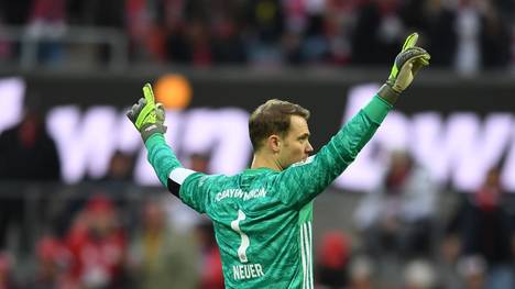 COLOGNE, GERMANY - FEBRUARY 16: Manuel Neuer of FC Bayern Muenchen celebrates at the final whistle during the Bundesliga match between 1. FC Koeln and FC Bayern Muenchen at RheinEnergieStadion on February 16, 2020 in Cologne, Germany. (Photo by Jörg Schüler/Bongarts/Getty Images)