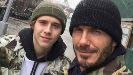 David Beckham (r.) sah sich mit seinem Sohn Brooklyn Chelsea gegen PSG an