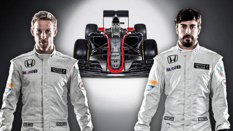 Jenson Button und Fernando Alonso posieren vor dem neuen McLaren