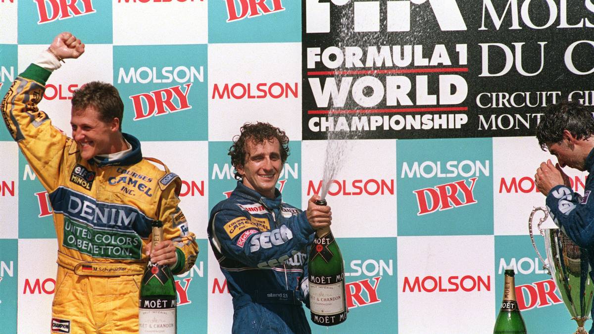Formel 1: Alain Prost feiert seinen Erfolg beim Großen Preis von Kanada. Mit ihm auf dem Podest sind Michael Schumacher (l.) und Damon Hill (r.)