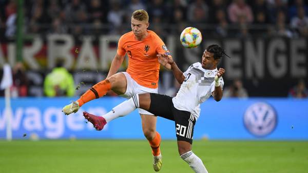 HAMBURG, GERMANY - SEPTEMBER 06: Matthijs De Ligt of the Netherlands is challenged by Serge Gnabry of Germany during the UEFA Euro 2020 qualifier match between Germany and Netherlands at Volksparkstadion on September 06, 2019 in Hamburg, Germany. (Photo by Matthias Hangst/Bongarts/Getty Images)