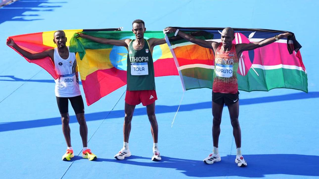 Tamirat Tola (M.) gewann den Olympia-Marathon in Paris