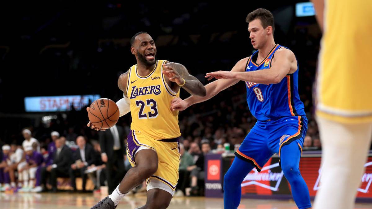 LOS ANGELES, CALIFORNIA - NOVEMBER 19:  LeBron James #23 of the Los Angeles Lakers dribbles past the defense of Danilo Gallinari #8 of the Oklahoma City Thunder during the second half of a game at Staples Center on November 19, 2019 in Los Angeles, California.  NOTE TO USER: User expressly acknowledges and agrees that, by downloading and/or using this photograph, user is consenting to the terms and conditions of the Getty Images License Agreement (Photo by Sean M. Haffey/Getty Images)