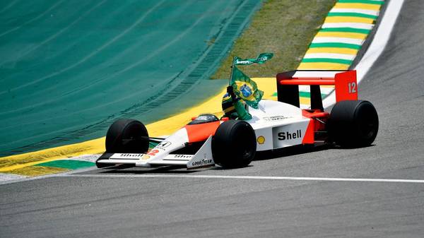 Bruno Senna, the nephew of the late Brazilian driver Ayrton Senna, powers the latter's McLaren during a tribute before the start of the F1 Brazil Grand Prix, at the Interlagos racetrack in Sao Paulo, Brazil on November 17, 2019. (Photo by Douglas Magno / AFP) (Photo by DOUGLAS MAGNO/AFP via Getty Images)