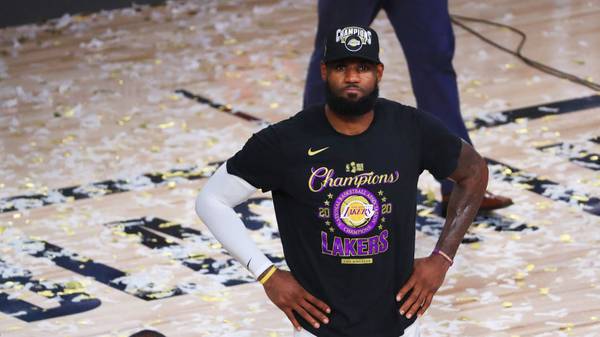 LAKE BUENA VISTA, FLORIDA - OCTOBER 11: LeBron James #23 of the Los Angeles Lakers reacts after winning the 2020 NBA Championship over the Miami Heat in Game Six of the 2020 NBA Finals at AdventHealth Arena at the ESPN Wide World Of Sports Complex on October 11, 2020 in Lake Buena Vista, Florida. NOTE TO USER: User expressly acknowledges and agrees that, by downloading and or using this photograph, User is consenting to the terms and conditions of the Getty Images License Agreement.  (Photo by Mike Ehrmann/Getty Images)