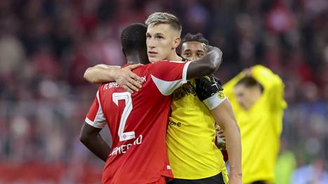 Nico Schlotterbeck lässt den BVB im Vertragspoker zappeln: Eine Entscheidung des Schlüsselspielers hängt wohl auch von einem Bayern-Star ab.