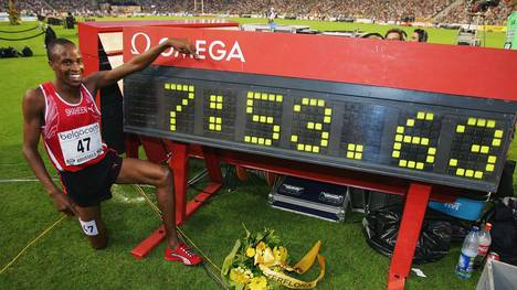 BRUSSELS, BELGIUM - SEPTEMBER 3: Shaheen Saif Saaeed of Qatar celebrates breaking the world 3000m Steple Chase record at the IAAF Golden League Meet in the Roi Baudouin Stadium on September 3, 2004 in Brussels, Belgium. (Photo by Clive Rose/Getty Images)