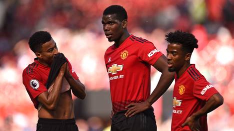 Paul Pogba (M.) will Manchester United laut Berater Mino Raiola verlassen