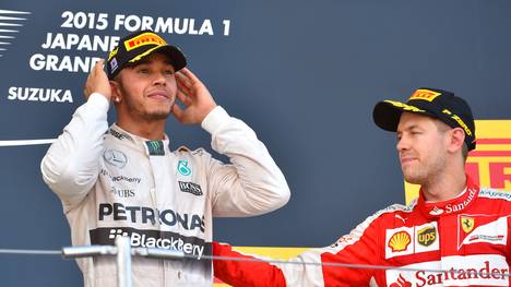 Ferrari-Pilot Sebastian Vettel (r.) musste Lewis Hamilton (l.) in Suzuka den Vortritt lassen