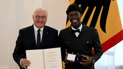 Frank-Walter Steinmeier (l.) und Dennis Schröder