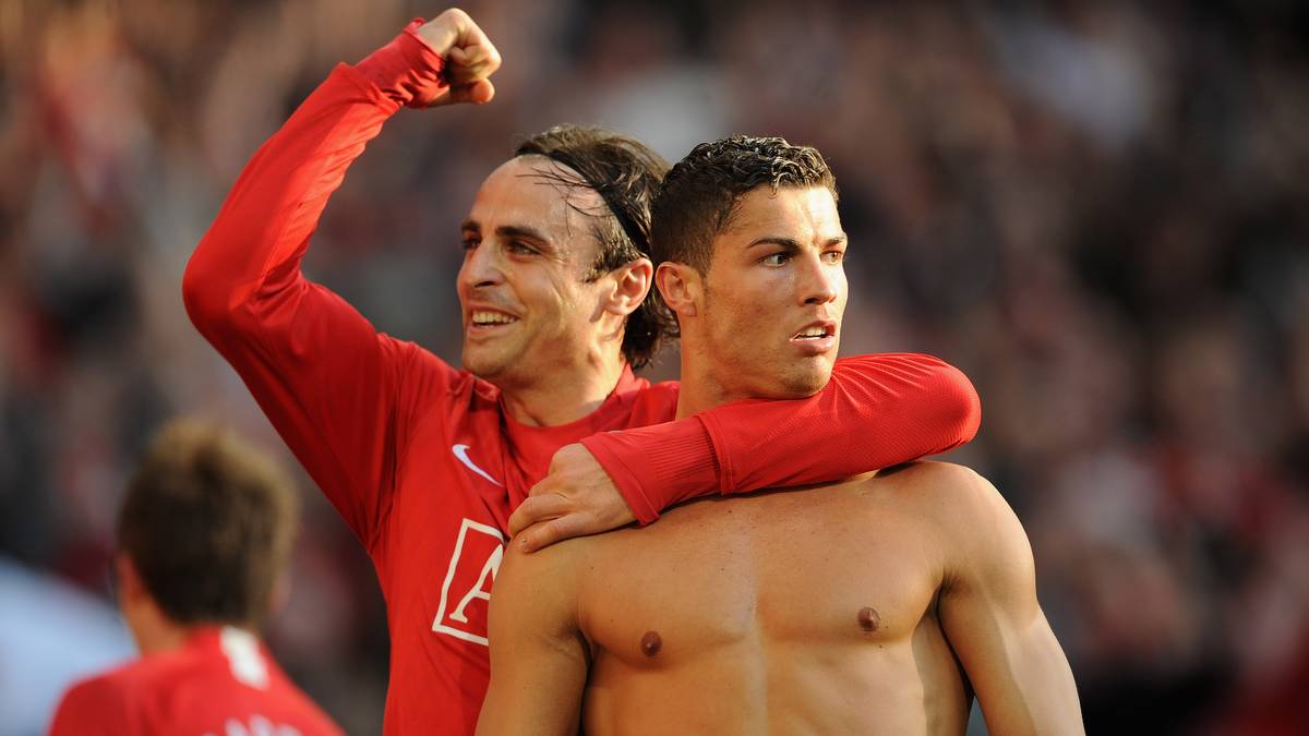 Dimitar Berbatov und Cristiano Ronaldo jubeln über den Sieg gegen Tottenham
