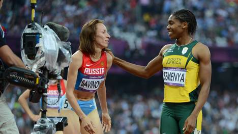 Russia's Mariya Savinova (L) celebrates 
