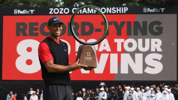 Tiger Woods of the US holds a victory trophy during the awarding ceremony of the PGA ZOZO Championship golf tournament at the Narashino Country Club in Inzai, Chiba prefecture on October 28, 2019. (Photo by TOSHIFUMI KITAMURA / AFP) (Photo by TOSHIFUMI KITAMURA/AFP via Getty Images)