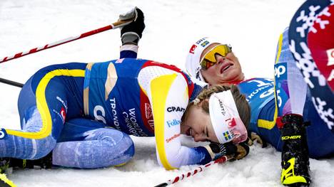 Image 1: Ebba Andersson and Frida Karlsson were completely exhausted at the finish line