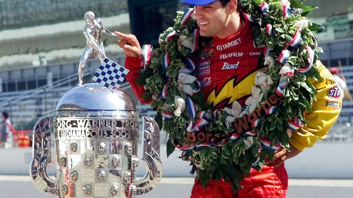 Juan Montoya of Colombia touches the Borg-Warner t