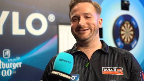 Arno Merk schwebt nach dem Finalsieg in der PDC Europe Super League im siebten Himmel und erinnert sich an Mario Götzes größten Moment.