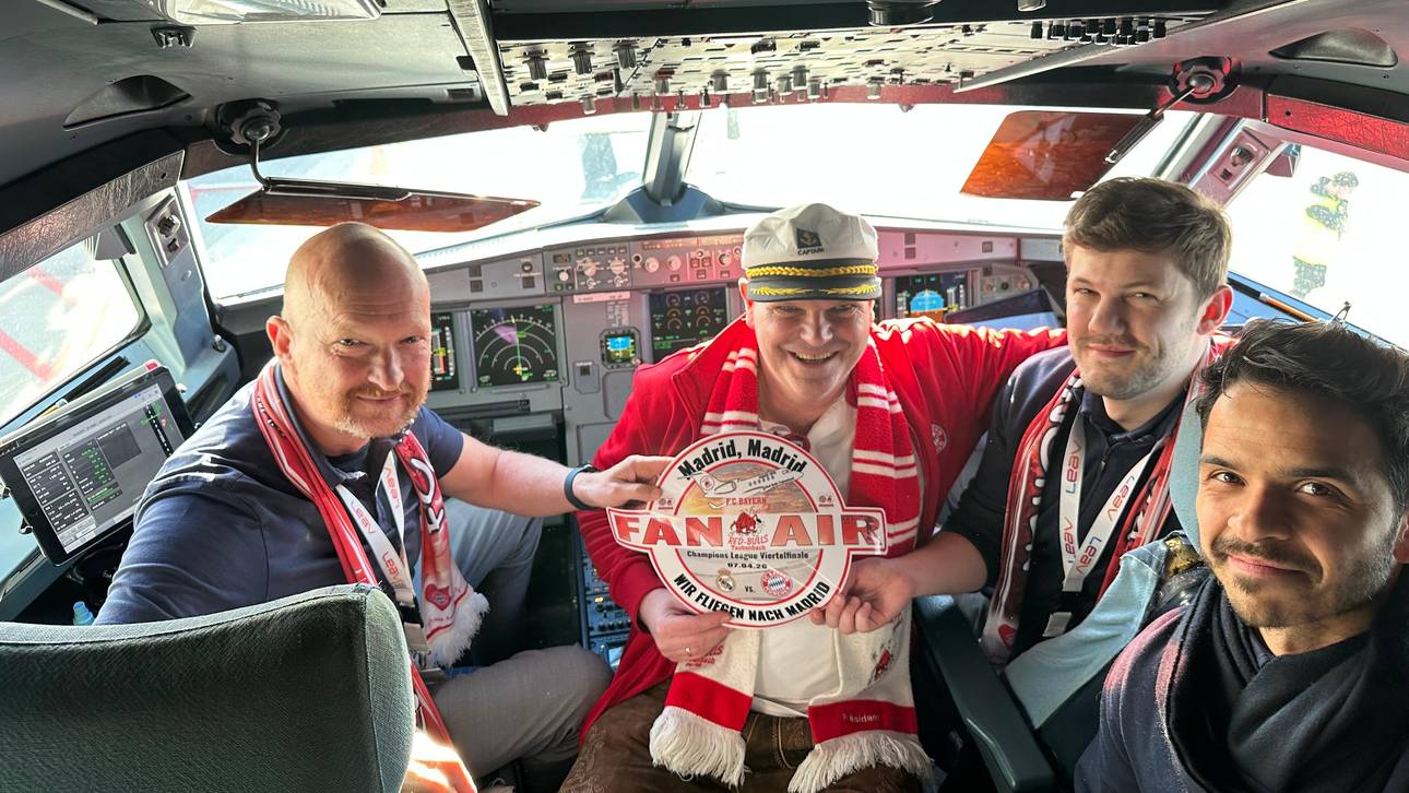 Rudi Grabmeier (2.v.l.) hat einigen Bayern-Fans ein eigenes Flugzeug nach Madrid organisiert