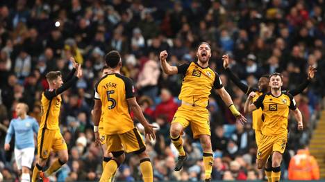 MANCHESTER, ENGLAND - JANUARY 04: Tom Pope of Port Vale celebrates after scoring his team's first goal during the FA Cup Third Round match between Manchester City and Port Vale at Etihad Stadium on January 04, 2020 in Manchester, England. (Photo by Alex Livesey/Getty Images)