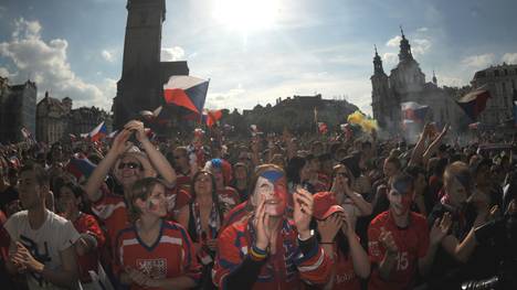 Czech ice hockey fans cheer for their te