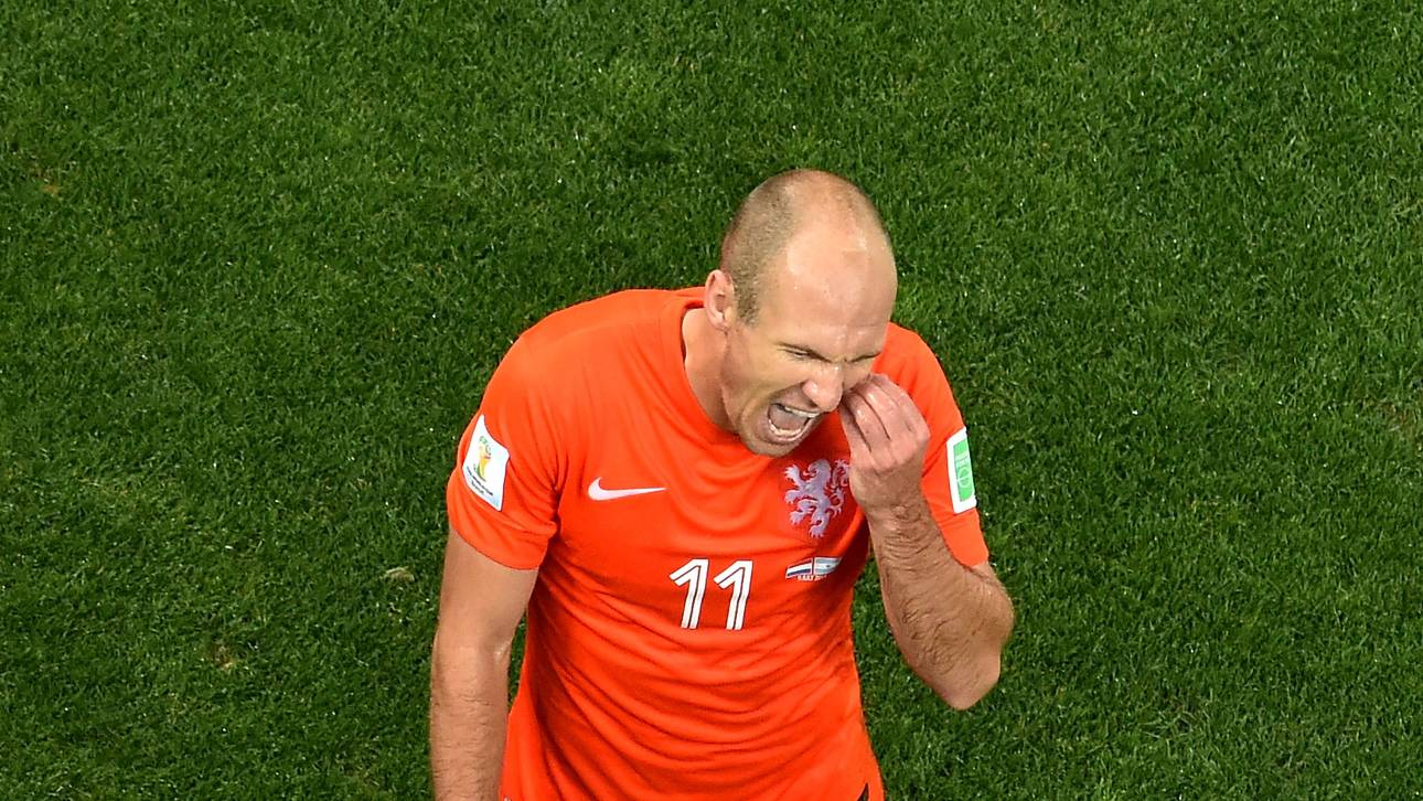 Oranje mit dem Rücken zur Wand