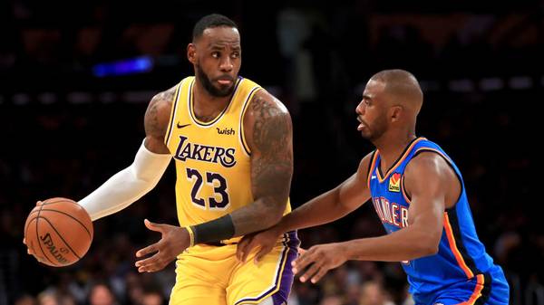 LOS ANGELES, CALIFORNIA - NOVEMBER 19:  LeBron James #23 of the Los Angeles Lakers controls the ball against Chris Paul #3 of the Oklahoma City Thunder during the second half of a game at Staples Center on November 19, 2019 in Los Angeles, California.  NOTE TO USER: User expressly acknowledges and agrees that, by downloading and/or using this photograph, user is consenting to the terms and conditions of the Getty Images License Agreement (Photo by Sean M. Haffey/Getty Images)