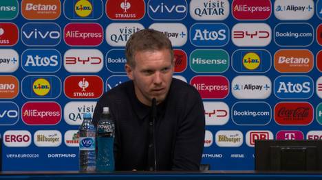 Bundestrainer Julian Nagelsmann fasst auf der PK ein wildes EM-Achtelfinale gegen Dänemark zusammen. Auf eine Frage zur Unwetter-Unterbrechung kontert er trocken.