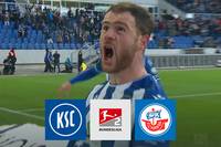 Lange Zeit steuert der Karlsruher SC im Kellerduell mit Hansa Rostock auf eine Heimniederlage zu. Dann aber sticht mal wieder Budu Zivzivadze, der von einer Slapstick-Einlage der Gäste profitiert.