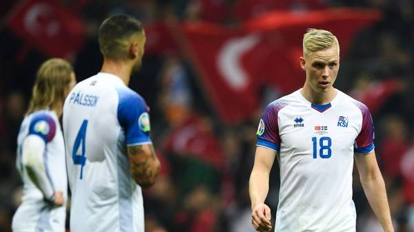 Iceland's defender Hordur Magnusson (R) reacts at the end of the UEFA Euro 2020 qualifying Group H group match between Turkey and Iceland at Turk Telekom Stadium in Istanbul, on November 14, 2019. (Photo by BULENT KILIC / AFP) (Photo by BULENT KILIC/AFP via Getty Images)