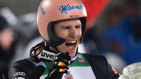 Germany's Karl Geiger celebrates the second place after the final competition jump of the Four-Hills Ski Jumping tournament (Vierschanzentournee), on December 29, 2019. - The first competition of the Four-Hills Ski jumping event takes place in Oberstdorf, before the tournament continues in Garmisch-Partenkirchen, (Germany), in Innsbruck (Austria) and in Bischofshofen (Austria). (Photo by Christof STACHE / AFP) (Photo by CHRISTOF STACHE/AFP via Getty Images)