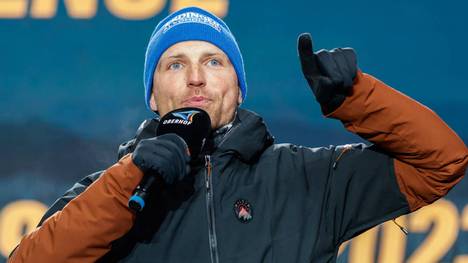 Image 13: Erik Lesser discusses the controversial rule change in biathlon.